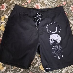 Black Board Shorts with White Graphic Design